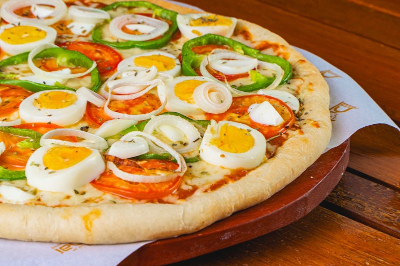 Dion's meat lovers overload pizza stacked high